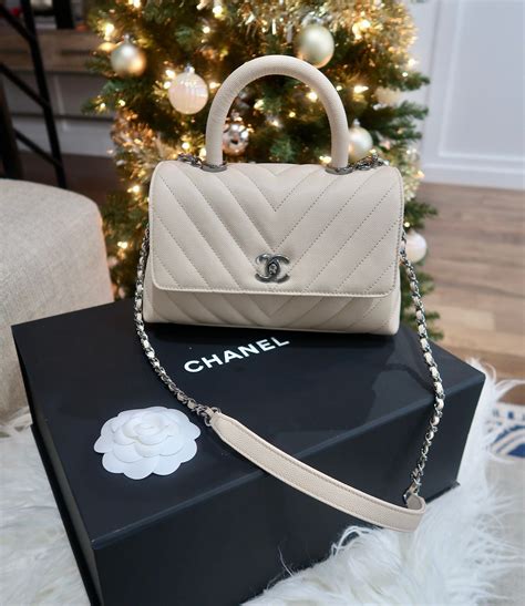 chanel handle bag small|Chanel bag with top handle.